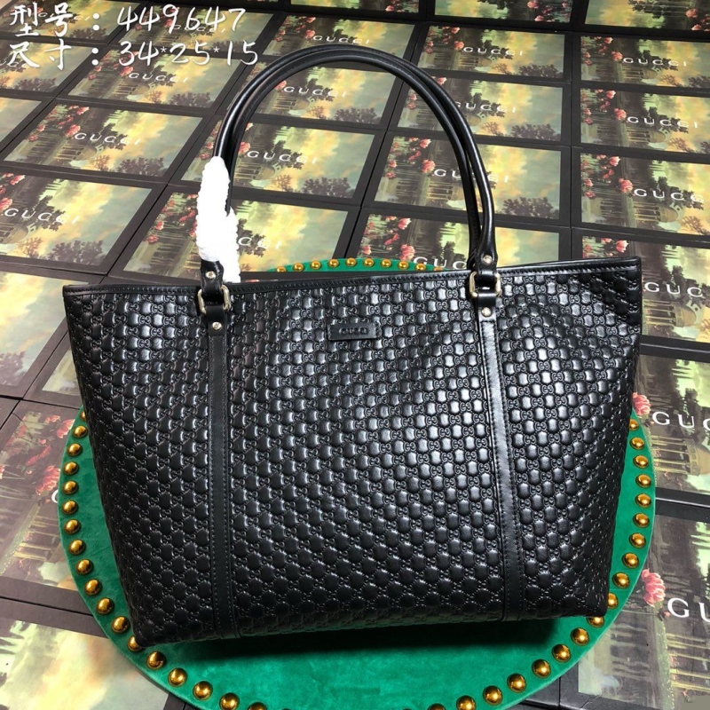 G*u*i shopping bags